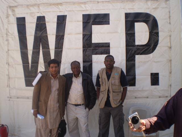 Team photo with WFP (World Food Programme) banner