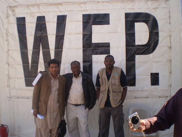 Team photo with WFP (World Food Programme) banner